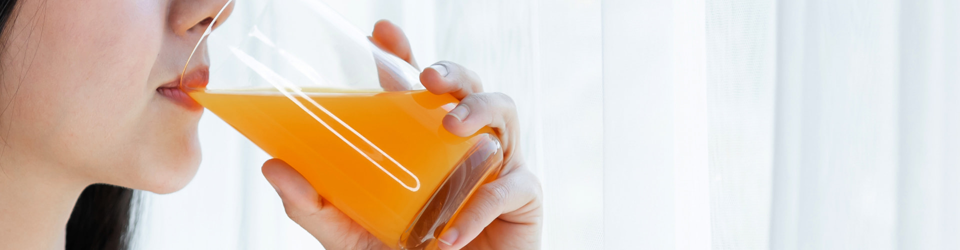 Drinking Kratom mixed with orange juice.